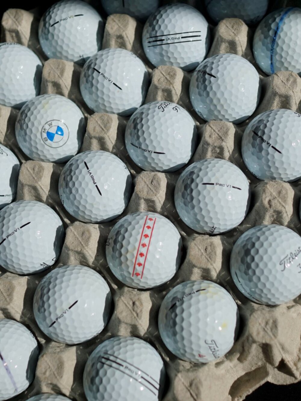 Two dozen (24) Titleist pro v1/pro v1x Golf Balls
